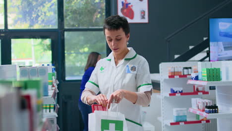 pharmacist preparing medicaments order