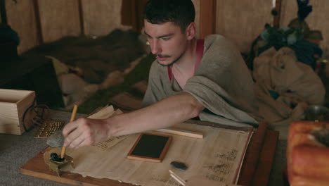 medieval scribe at work