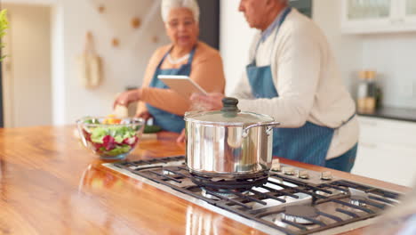 senior couple cooking together