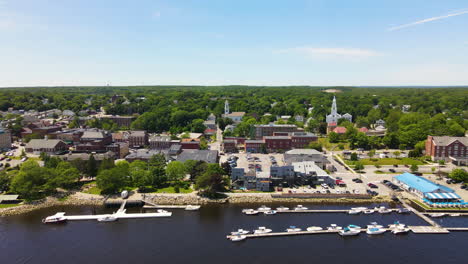 Aerial-footage-flying-over-Kennebec-River-towards-the-City-of-Bath,-Maine