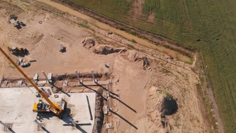 construction site, hall construction, crane in the middle