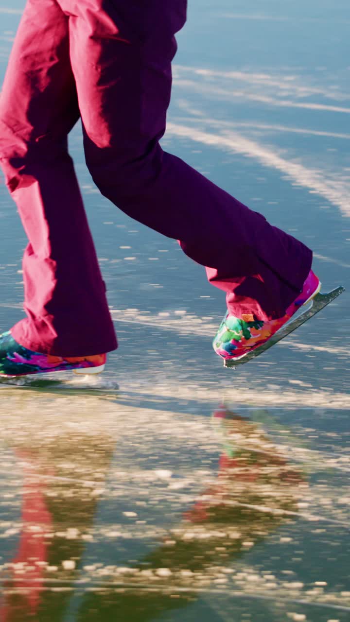 Graceful Skater Gliding on Glassy Ice, Captured in Dynamic Motion, Showcasing Expert Technique and Vibrant Attire, Exploring the Beauty of Winter Activities, Reflecting Serenity and Joy of Ice Sports