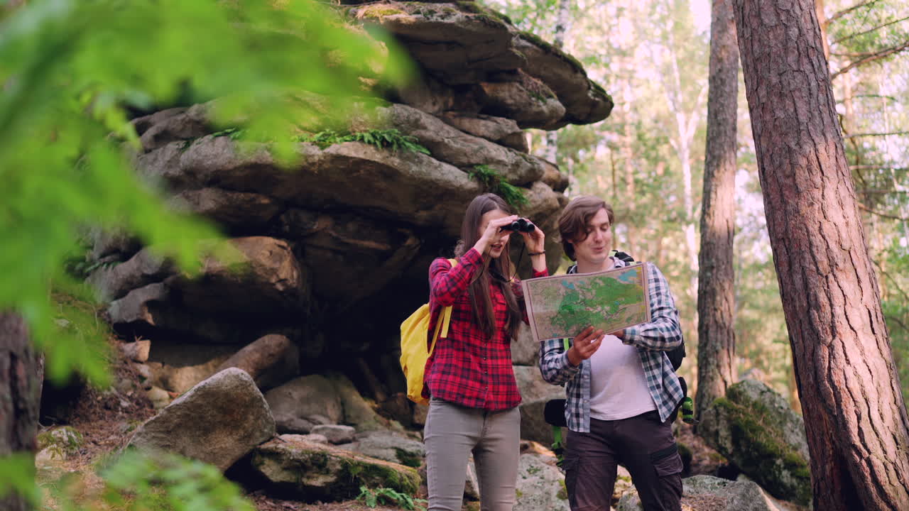 Hikers in a Forest, Using a Map