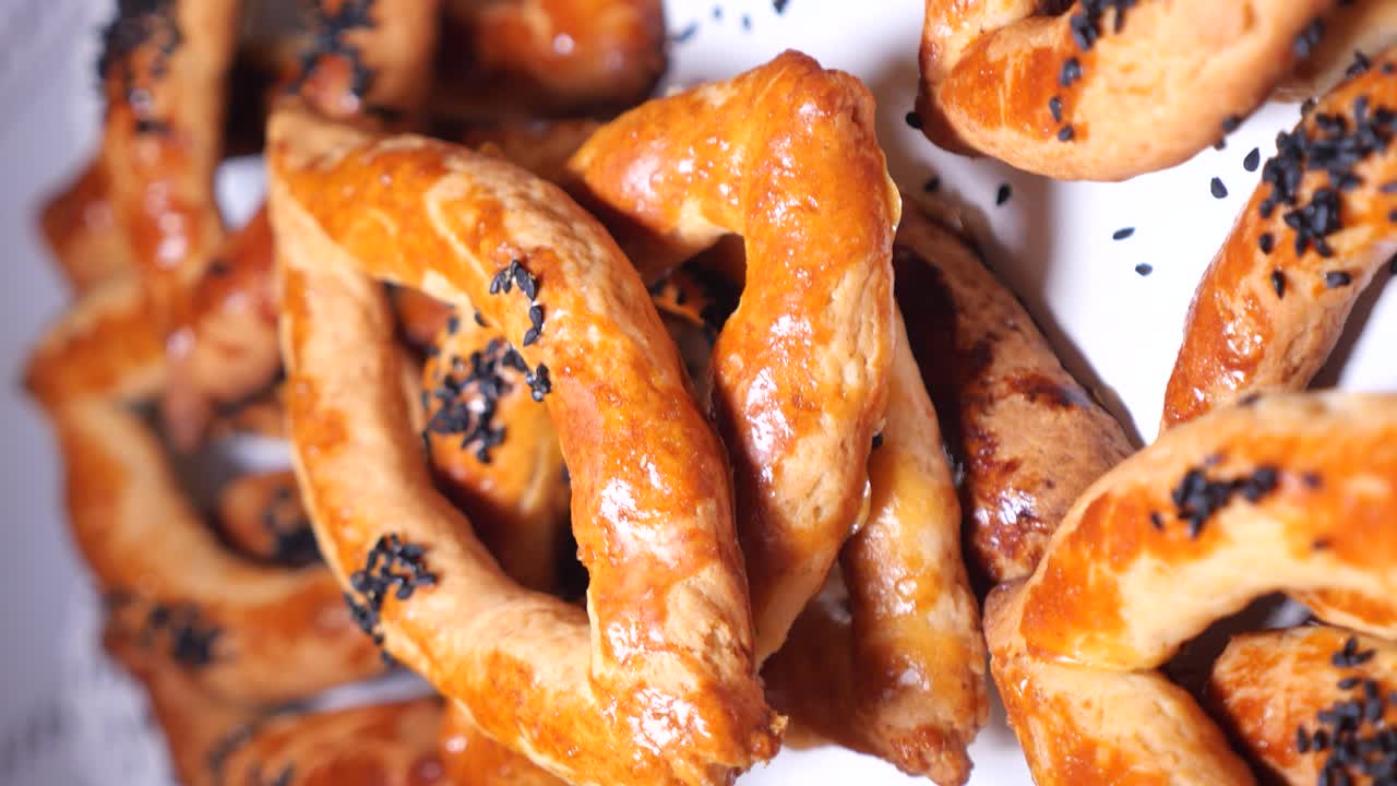 Golden Baked Pastries with Black Sesame Seeds