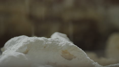 sifting flour while making dough