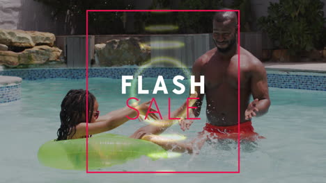 in pool, man with child on float, animation of flash sale text overlay