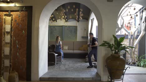 photographer capturing a model in an architectural interior design space