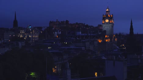 an establishing shot of edinburgh scotland at night