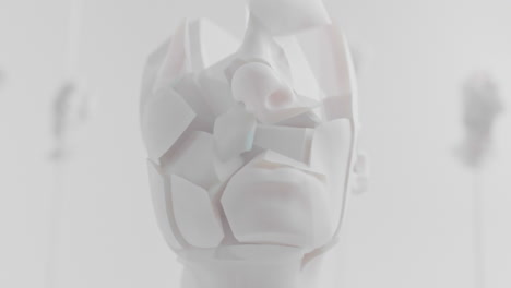 destroyed android head on spike in white space