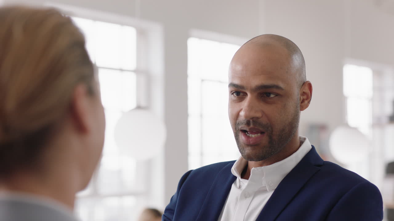 confident businessman meeting clients professional business people discussing partnership deal in startup office workspace