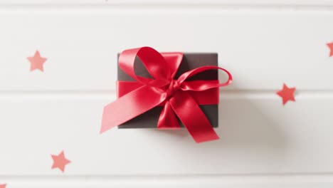 video of christmas gift with christmas decoration and copy space on white background