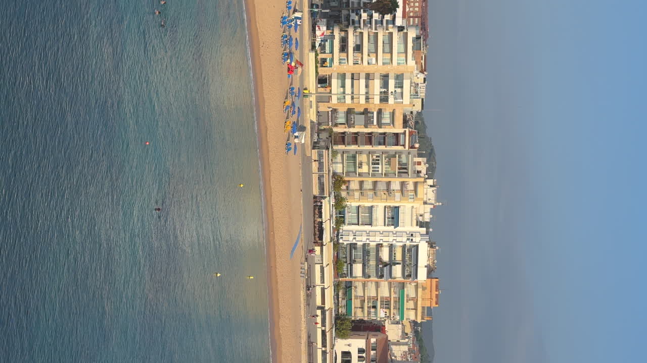 vertical video of Blanes on the Costa Brava of Girona Main beach blue copy space sea in the foreground