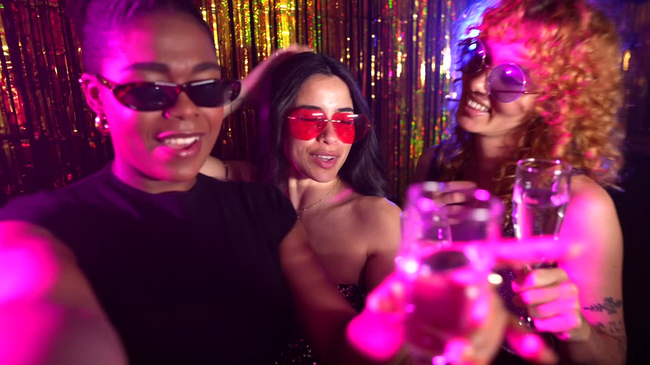 Women celebrating with champagne at a party