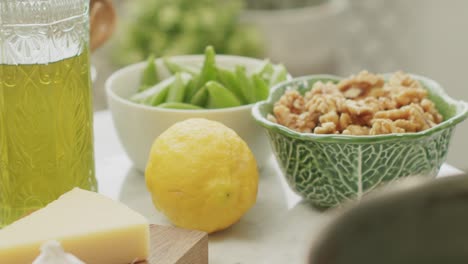 fresh raw ingredients for pasta preparation arranged on table