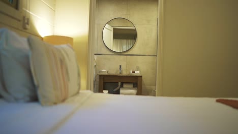 cozy hotel room with modern bathroom