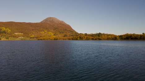 view from norwegian sea of scenic senja island in troms og finnmark, norway during autumn