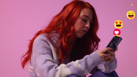 gen z woman looking at mobile phone with motion graphics emojis showing multiple social media notifications liking and reacting to online content