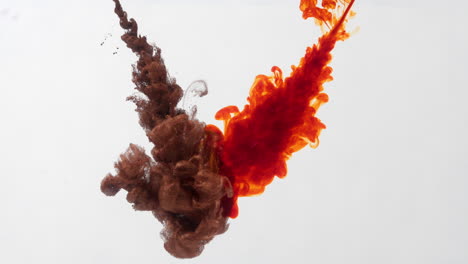 liquid-art,-bronze-and-orange-liquids-injection-splash-into-watertank