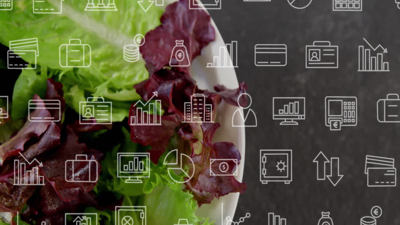 Business icons overlaying fresh lettuce, representing data and analytics concepts