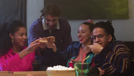 people eating pizza