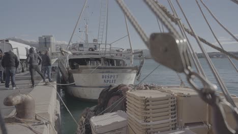 an old fishing boat anchored in the harbor