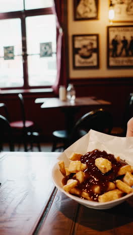 delicious poutine in a restaurant