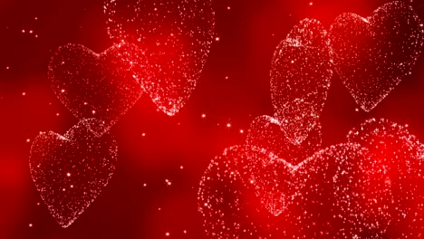 glitter hearts on red background