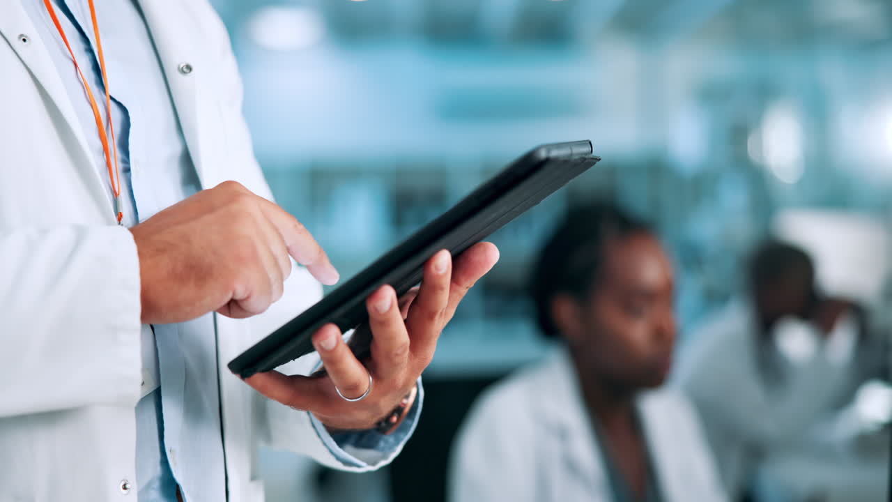 Doctor using a tablet in a medical setting