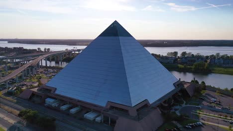 Good-vista-aérea-shot-of-the-Memphis-pyramid-and-downtown-business-district-of-Memphis-Tennessee-is-background-1