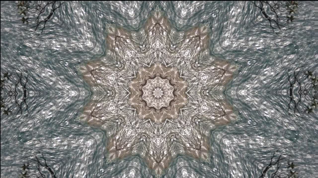 다채로운 추상적인 배경과 칼레도스코프 효과의 움직임