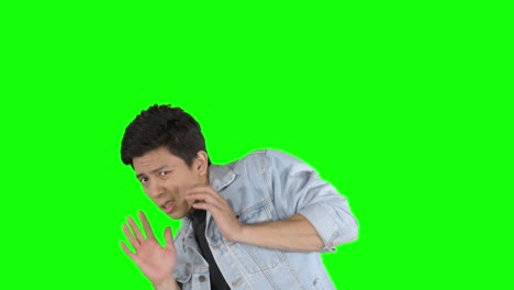 frightened man looking at the camera in studio
