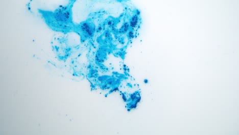 abstract blue and white paint mixing