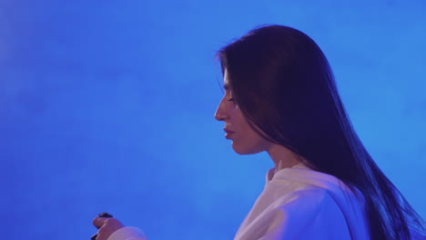 Portrait Of Young Woman With A Vr Headset On A Colorful Neon Light Background