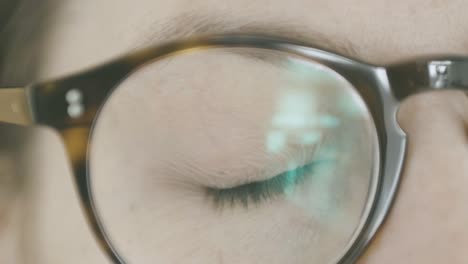 Awakening,-detail-of-a-girl's-eye-slowly-opening-from-closed-and-looking-into-the-room