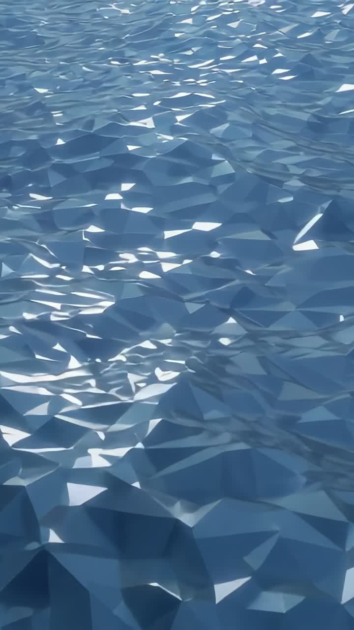 Video verticale: piano d'acqua blu sfaccettato e scintillante che reagisce al sole, formando increspature e riflessi