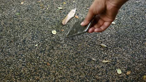 Close-up-of-man-hand-holding-broken-smart-phone