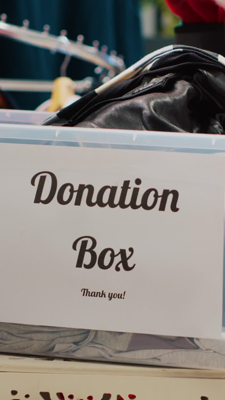 Vertical video Worker collecting donations