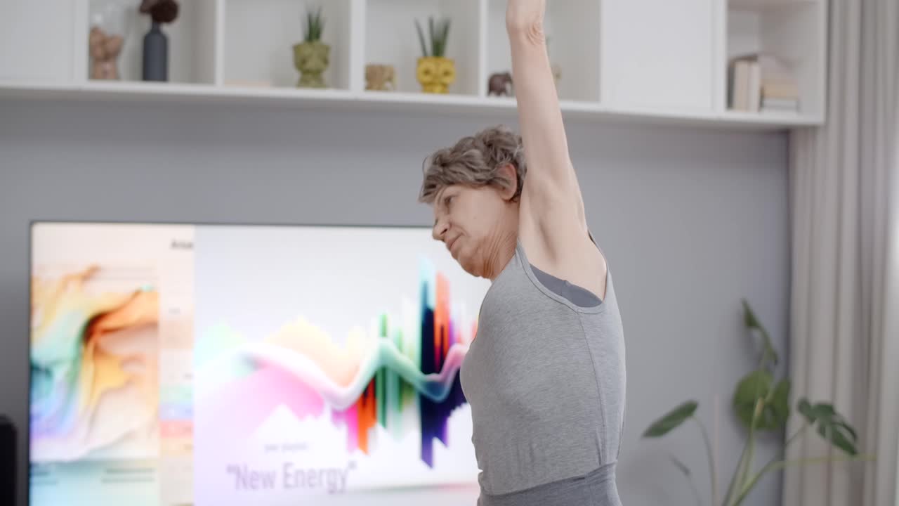 Senior Woman Doing Stretching Exercises at Home