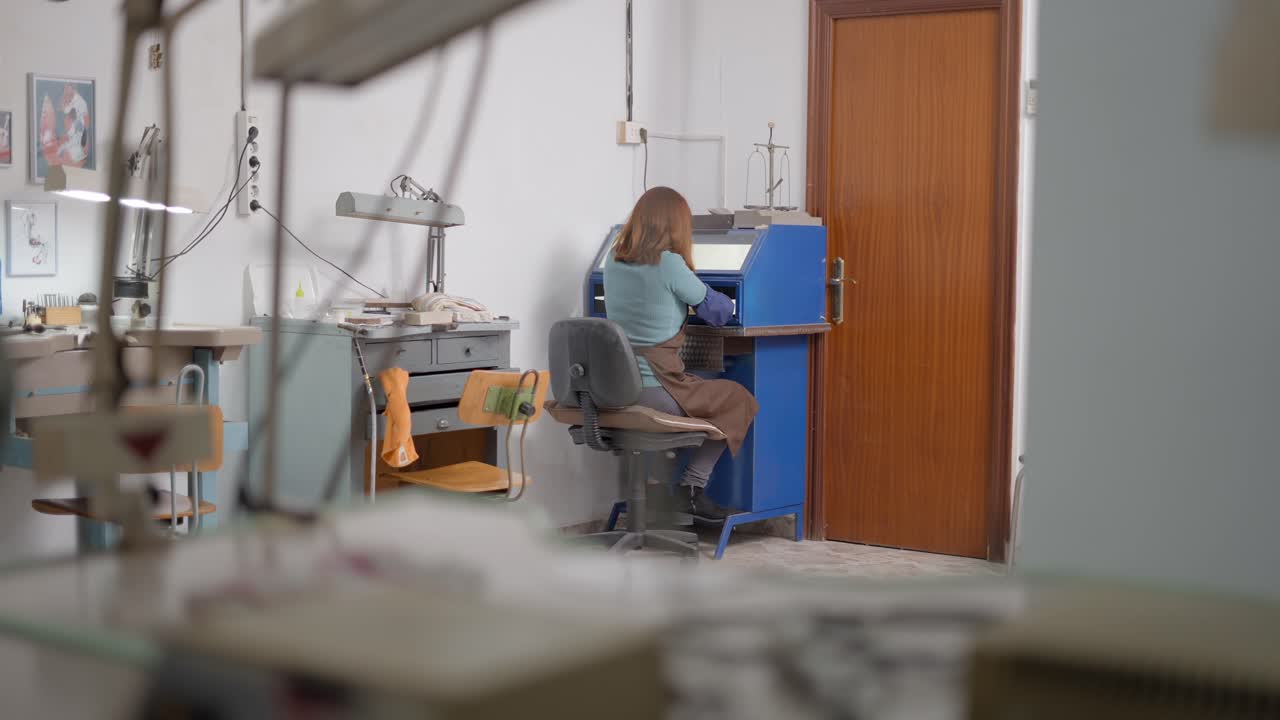 Jeweler at Work in a Workshop