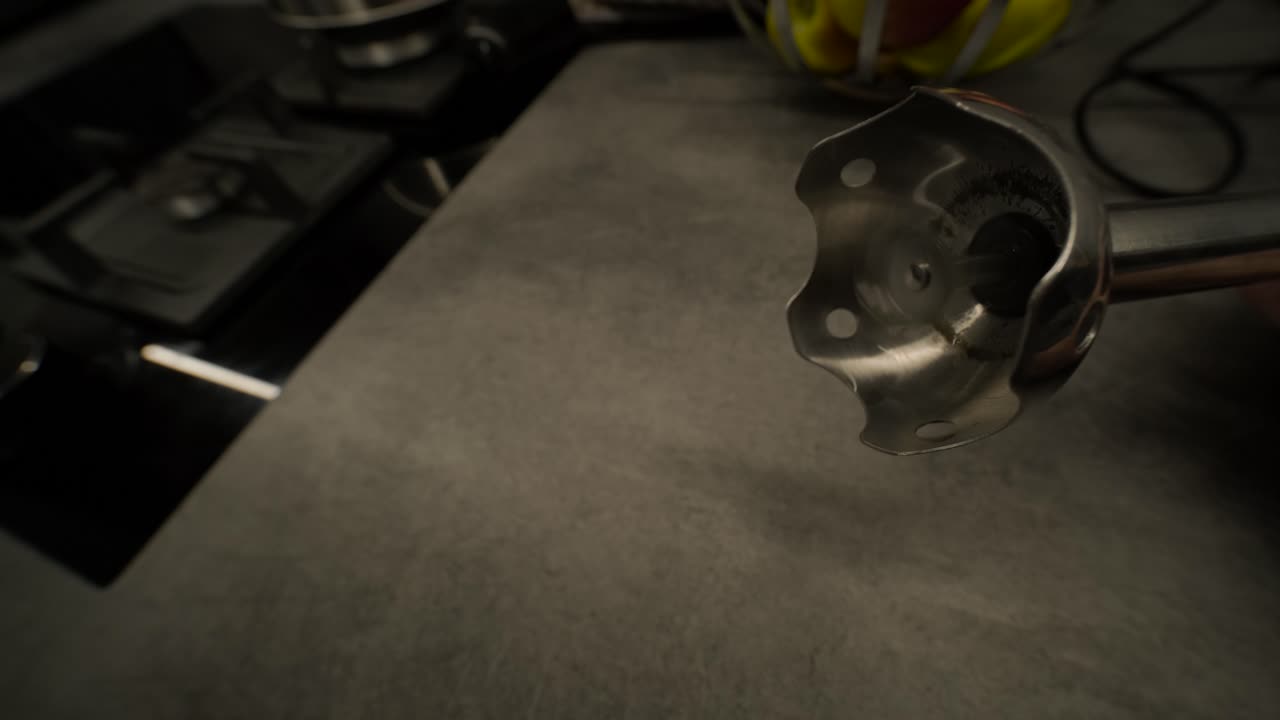 Immersion Blender Blades Spinning on Kitchen Counter