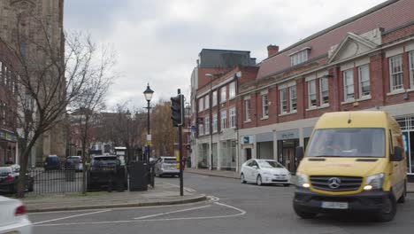 dhl van passes by in london street