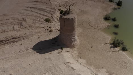 ancient tower in a dry lakebed