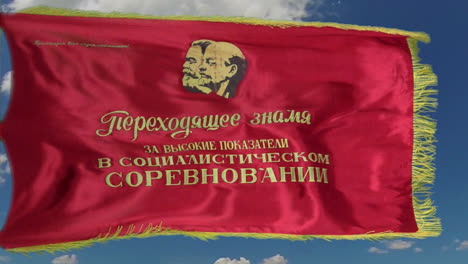 flag depicting marx and lenin flies in a brisk breeze