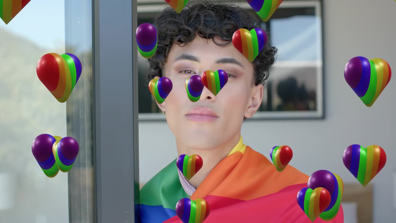 Model holding pride flag at door during shoot rainbow hearts drifting across lens for marketing