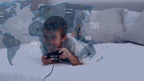 animation of world map with data processing over biracial boy playing video games