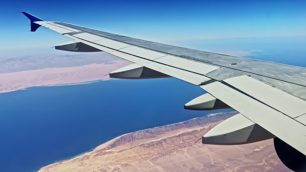 Aerial view of Sharm El Sheikh coast from airplane window sunny day