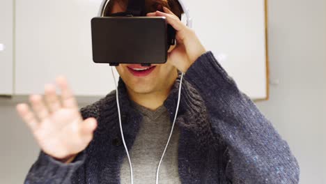 man using virtual reality headset at home