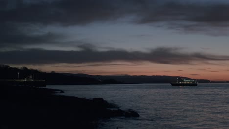 boat on water at dusk