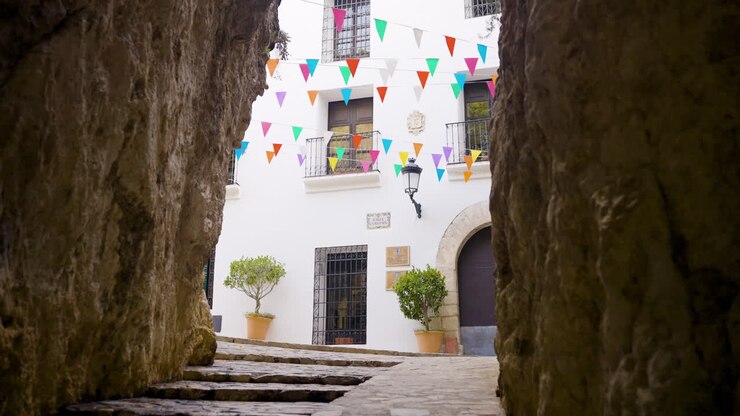 Charming Spanish Alleyway with Colorful Decorations