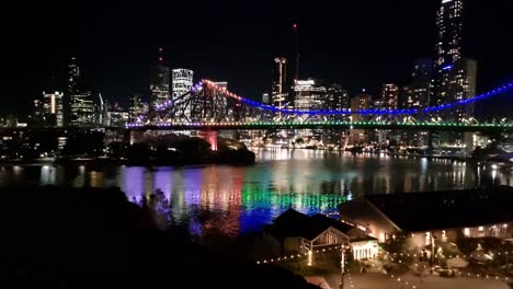 brisbane city at night with illuminated story bridge